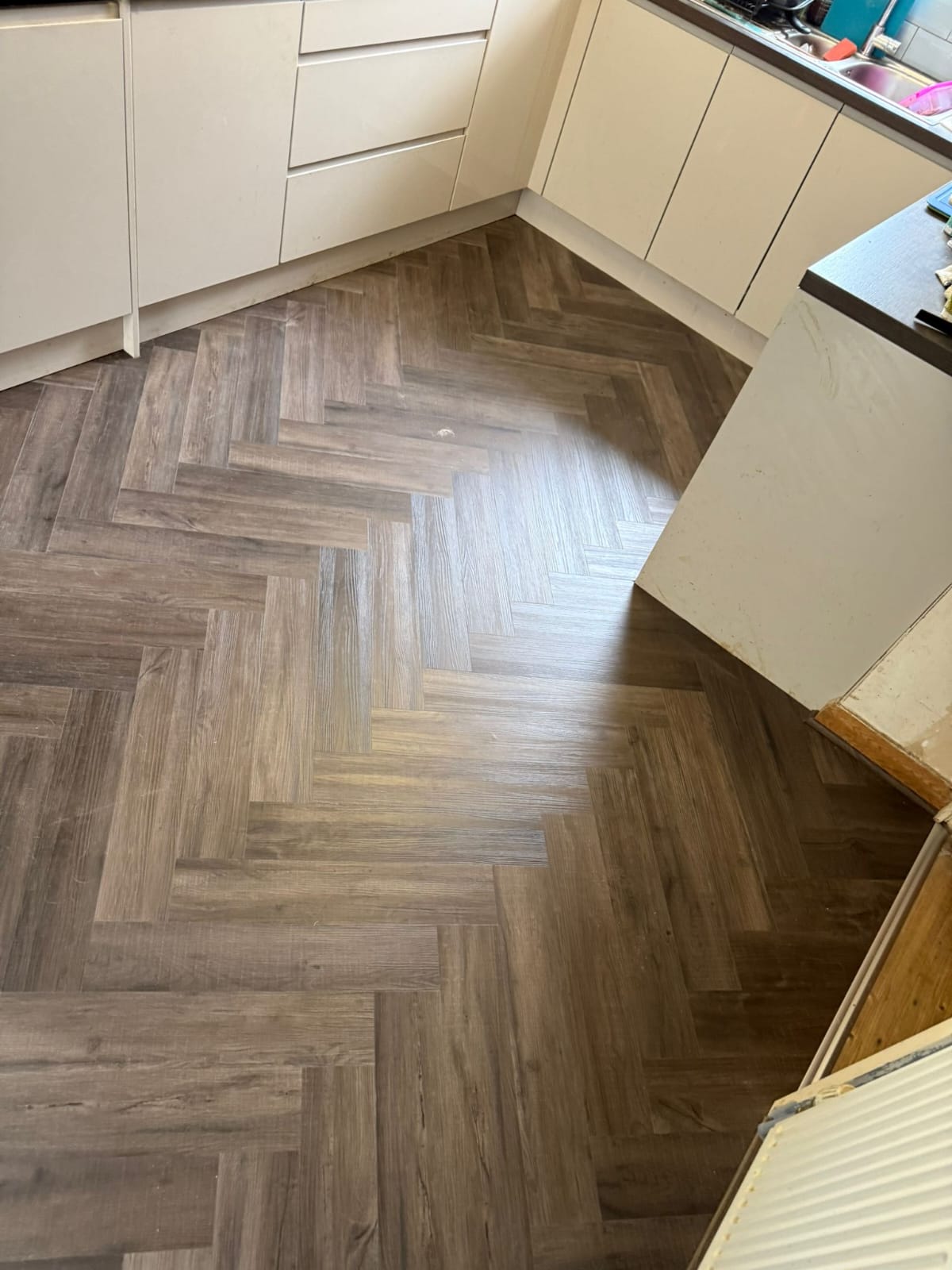 Completed flooring in a kitchen area